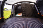 The spacious interior of the Discovery 6 Berth Inflatable Tent with a carpet