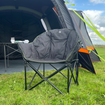 An image of the Olympus XL Camping Chair Black & Green from OLPRO outside of an awning.