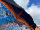 The window & vent of the Uno Breeze v2 Campervan Awning - Orange by OLPRO, imageset:Orange