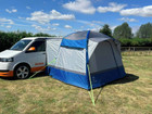 Uno Breeze® v2 Blue Campervan Awning OLPRO attached to a VolksWagen T5 on a campsite, imageset:Blue