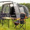 Image of Henwick Padded Folding Camp Chair Orange & Black by OLPRO lifestyle with bamboo compact table.