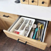 Extendable Drawer Organiser OLPRO - inside a kitchen drawer with cutlery