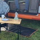 Awning Tunnel Mat 1500mm x 800mm Black Rubber with Orange Edge Trim being used within a campervan awning tunnel.