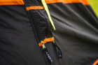 A valve cover on the Discovery inflatable Tent OLPRO in the standout out Black & Orange Colourway