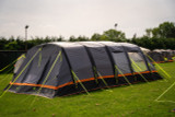 The Discovery 6 Berth Inflatable Tent shot from the outside with the door on