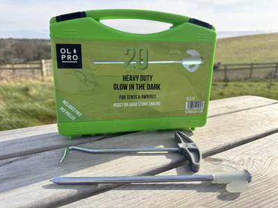 The case of 20 Glow in the Dark Pegs with Peg puller from OLPRO showing the case and its contents.