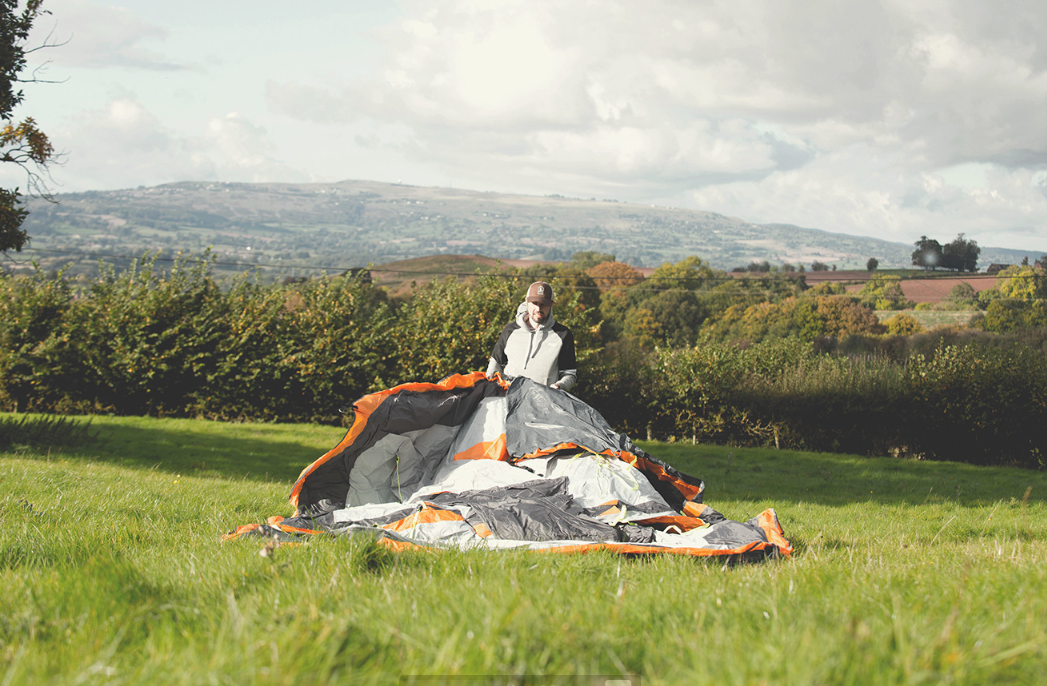 OLPRO Managing Director Daniel Walton setting a two man OLPRO tent up