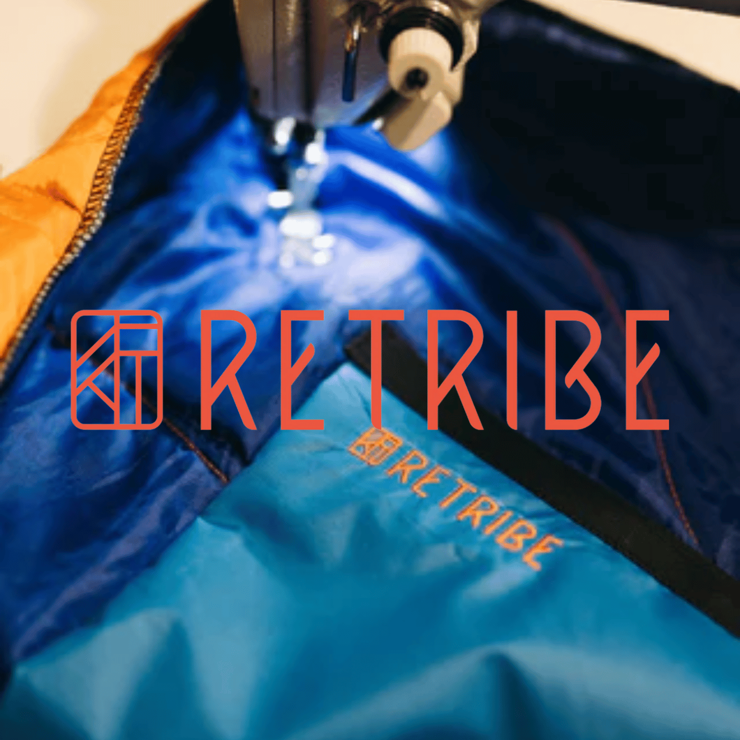 A machine sewing sustainable clothing with the retribe clothing logo below it. Retribe is one of OLPRO's sustainable partners