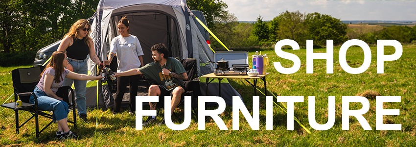 A group friends sit in OLPRO Chairs in front of an OLPRO Cubo Breeze Driveaway Campervan Awning, to their right is the text "Shop Furniture"