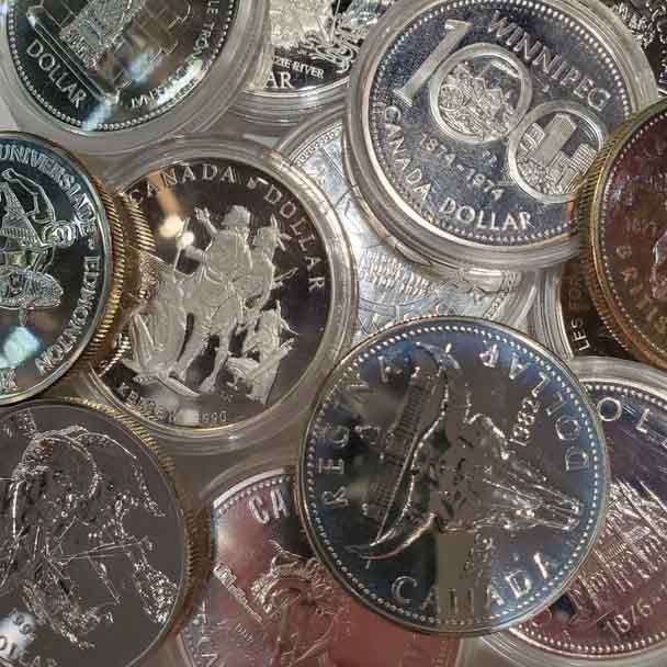 E-TRANSFER ONLY  25 MIXED CANADIAN SILVER DOLLARS (1971-1991) (3.75oz. SILVER)