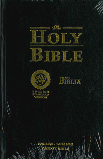 The cover is black with gold lettering saying Holy Bible and Ang Biblia. It says English-Tagalog diglot Bible at the bottom.
