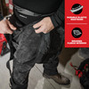 Milwaukee 441 base layer pants being worn under heavy-duty work bibs.