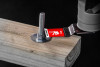 Diablo carbide teeth oscillating blade cutting metal bolt in wood.