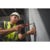 Professional using the Wiha 77891 SoftFinish 11-in-1 multi-driver to install an electrical outlet with interchangeable screwdriver bits.