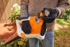 STIHL BA080115913 BGA 30 cordless blower set with AS 2 battery being installed into the handheld blower for quick startup and operation.