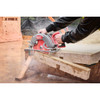 Milwaukee 3026-21HD M18 FUEL rear handle circular saw in use on a construction jobsite.