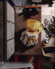 Watson A281BB Econo Grain leather work gloves shown in a workshop environment.