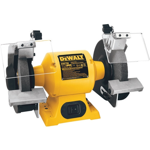 DEWALT DW758 8-inch heavy-duty bench grinder with yellow motor housing and dual grinding wheels (36 grit and 60 grit).