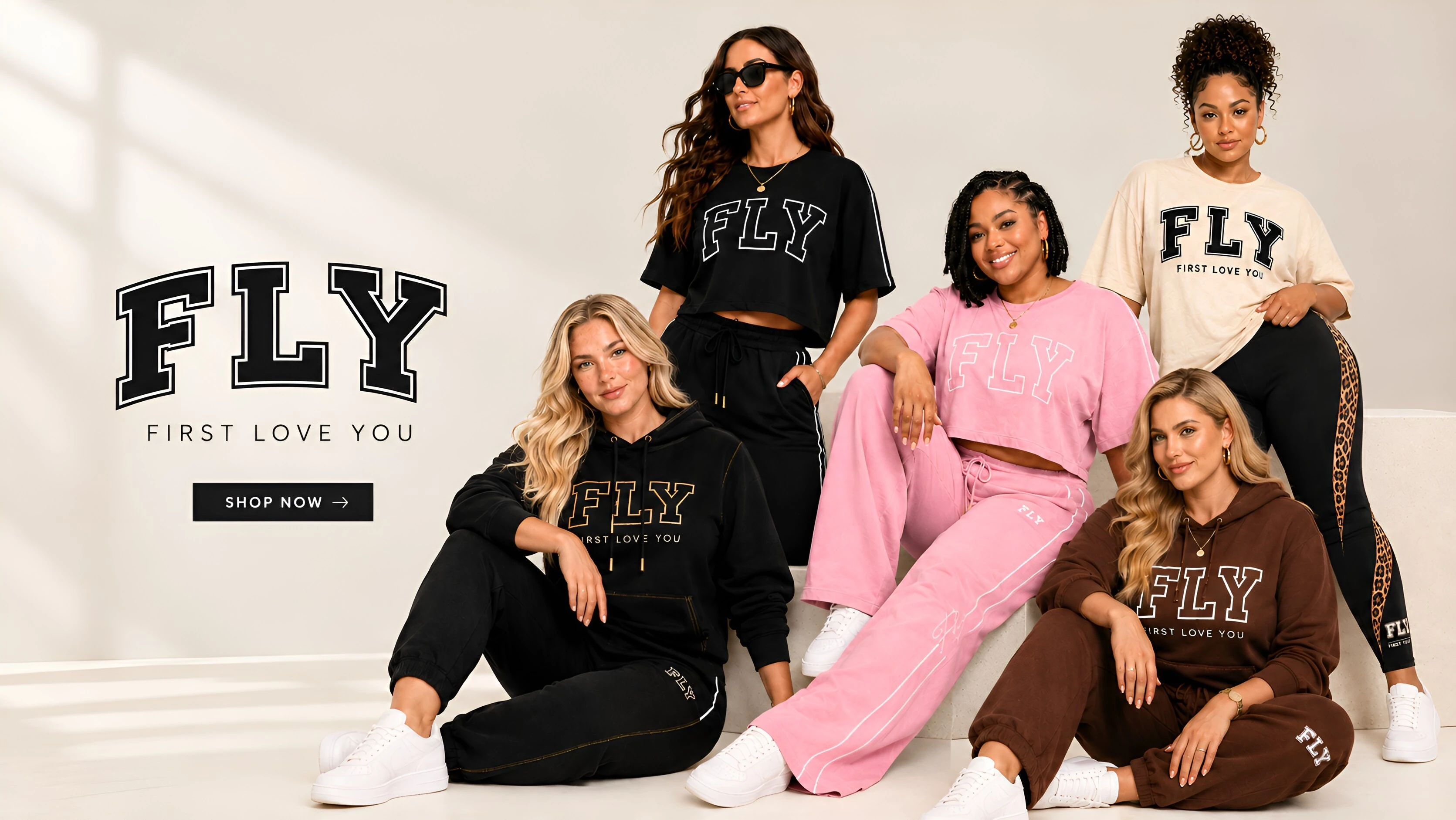FLY First Love You — women wearing black, pink, cream and chocolate FLY matching sets. Shop now.
