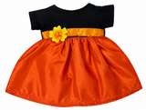 Flat view Happy Halloween dress for 15-inch baby dolls featuring a black short-sleeve bodice, shiny orange satin gathered skirt, coordinating orange waistband, and bright yellow flower accent. Halloween-themed Pinterest pin with pumpkins, bats, and autumn leaves. Shop Doll Clothes Superstore!