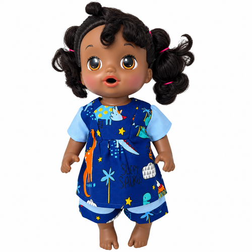Front view Handmade dinosaur print shorts outfit for 14-inch baby dolls featuring a navy blue top with colorful dinosaurs, light blue short sleeves, and matching baby blue shorts with dinosaur print trim. Shown on a baby doll with a playful dinosaur-themed Pinterest background.