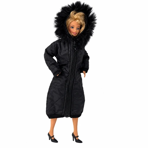 Side view Blonde fashion doll wearing a long black quilted winter coat with a fluffy faux fur-trimmed hood, front zipper, and matching black Mary Jane heels. Stylish winter outfit designed to fit 11.5-inch fashion dolls like Barbie.