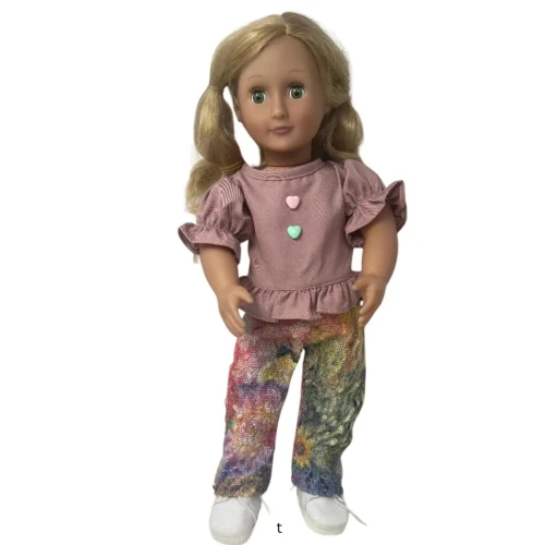 Give your 18 inch girl doll a cute, comfortable everyday look with this two-piece blouse and pants outfit.