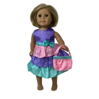 18-inch doll in a purple, pink and teal dress with a matching purse
