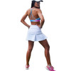 White Perlina skort and Marina sports bra. Stay cool and dry during any activity.