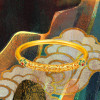 Gold lotus copper-enamel bangle bracelet displayed against an artistic Dunhuang-inspired background with cloud motifs.