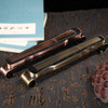 Guqin-inspired antique copper incense burner angled view