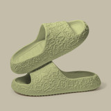 Green non-slip slippers featuring a stylish animal print design.