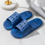 Stylish men's slippers with a striped texture design.