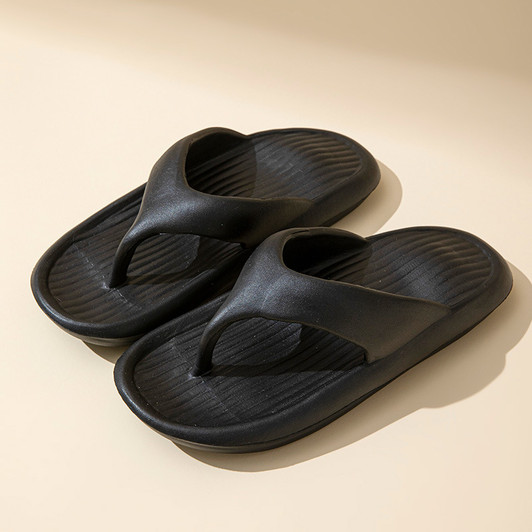 Black solid color striped flip-flops for men.
