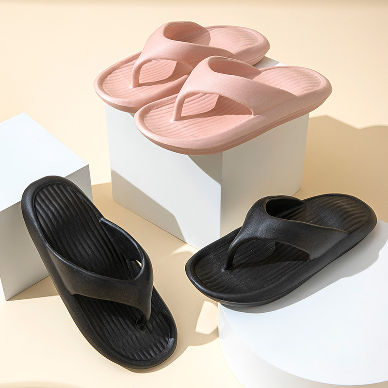 Pink and Black. Enjoying a leisurely stroll in our pink Striped Texture Flip-Flops for Women.