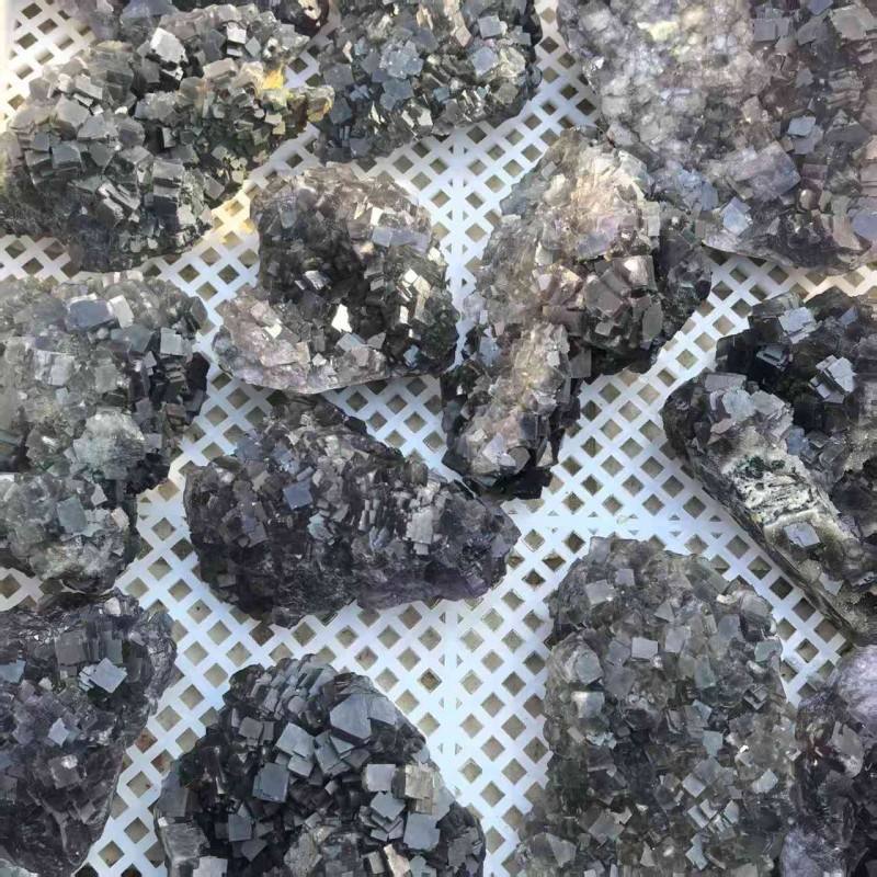 Natural purple fluorite rough specimen - view 1