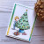 Card made using decorating the tree digital stamp