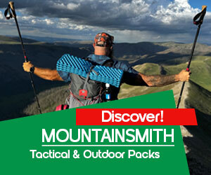 Graphic, person standing on mountain ridge with trekking poles and MOUNTAINSMITH backpack, text,  Fresh Drop: MOUNTAINSMITH Tactical & Outdoor Packs - Just In!