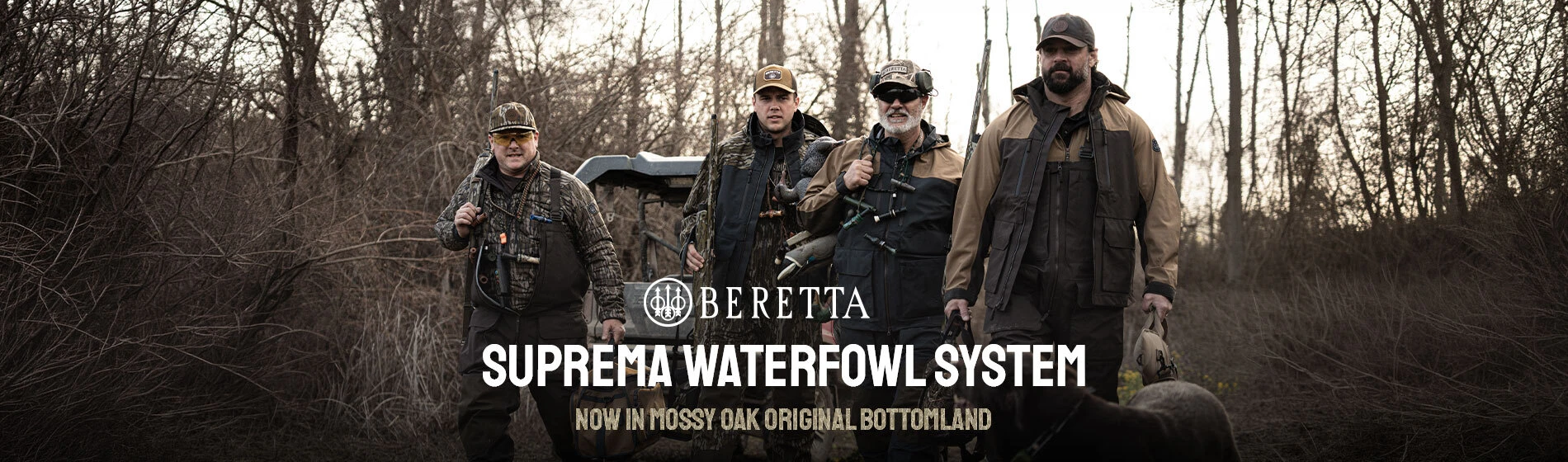 graphic, four men in camouflage and hunting outerwear walking forward through a bare winter forest carrying shotguns and gear, with a hunting dog visible in the lower right, text, Shop BERETTA Waterfowl Collection: Engineered for Every Forecast, Now in Mossy Oak Original Bottomland