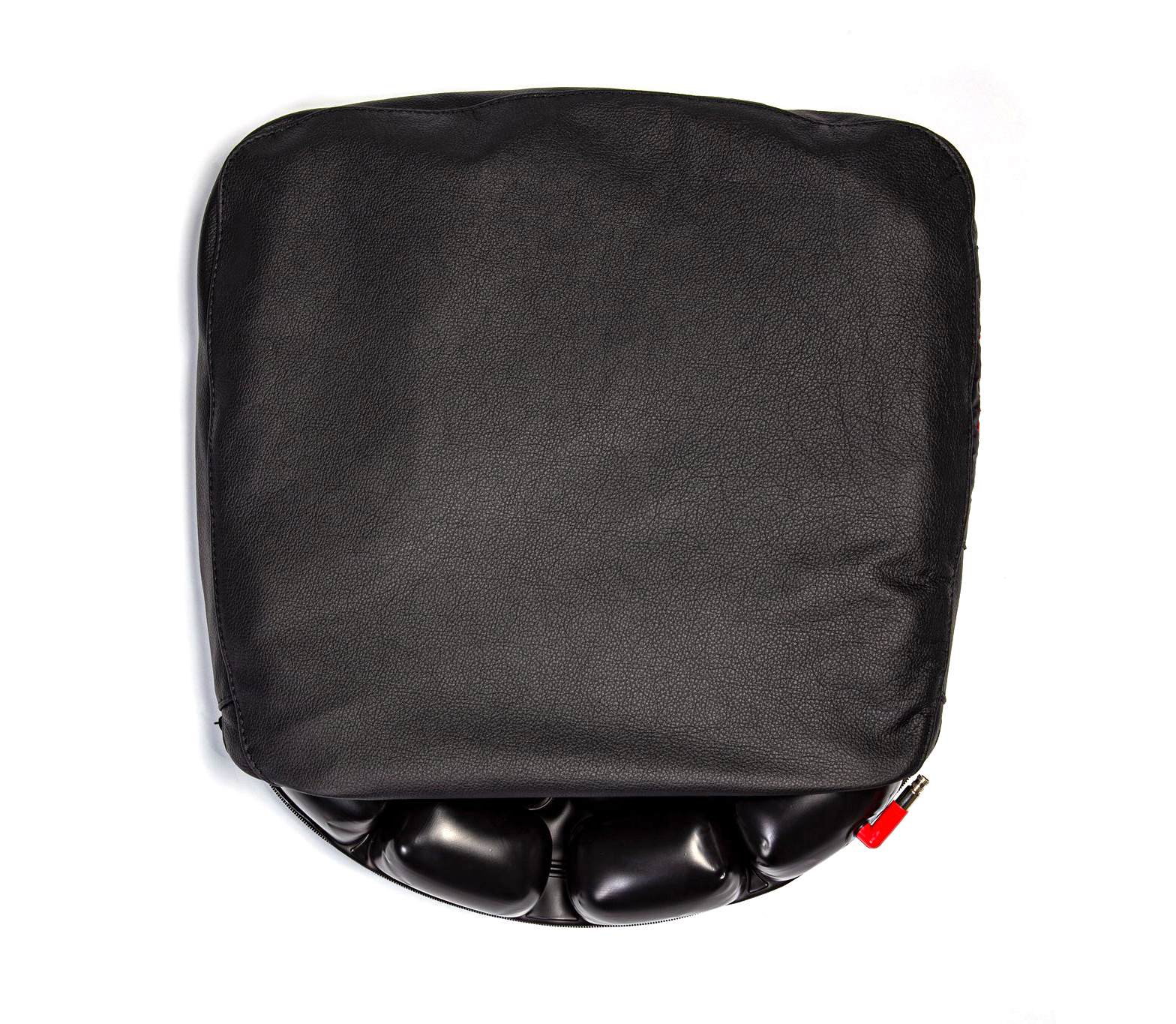 A black leather seat cushion with a shiny black interior and a red valve