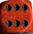 Fire Speckled d6 w/spots 12mm - DS1221