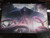 Playmat Emrakul, the Promised End (60x40cm con bordes cosidos)