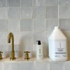 Refillable 16 .2 oz Apotheke White Vetiver bath gel bottle with black pump