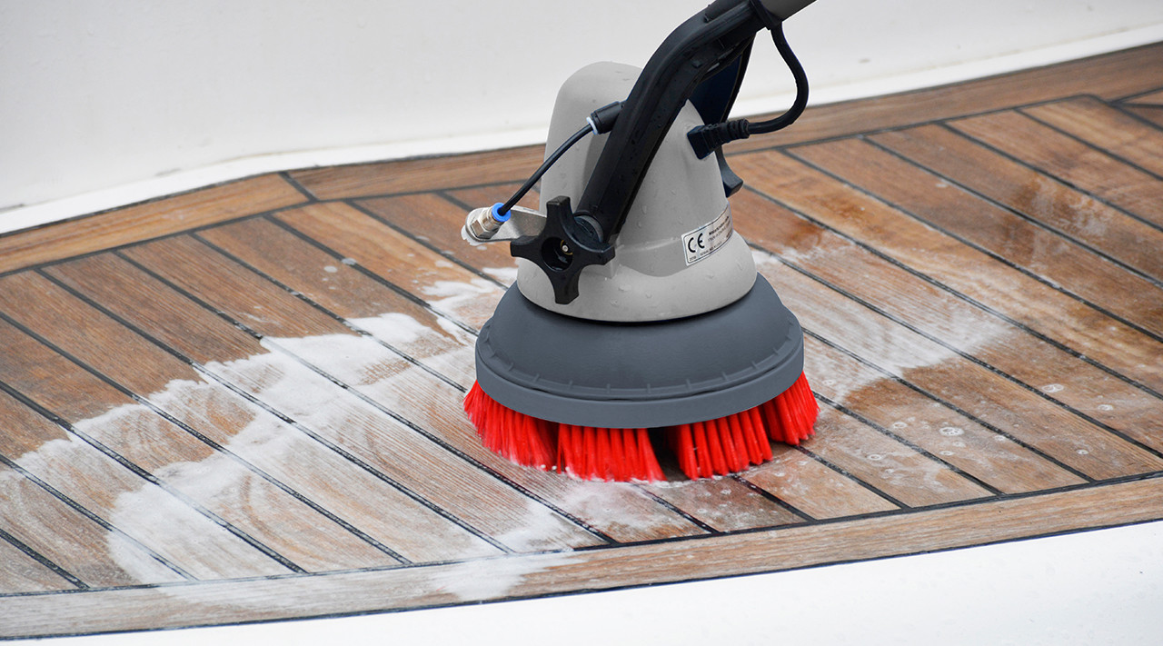 Automatic floor scrubber machine in operation on a commercial floor