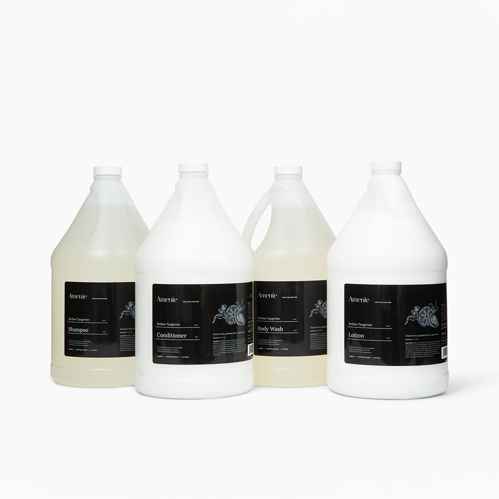 Amenie Sicilian Tangerine product bundle in gallon size with minimalist white background