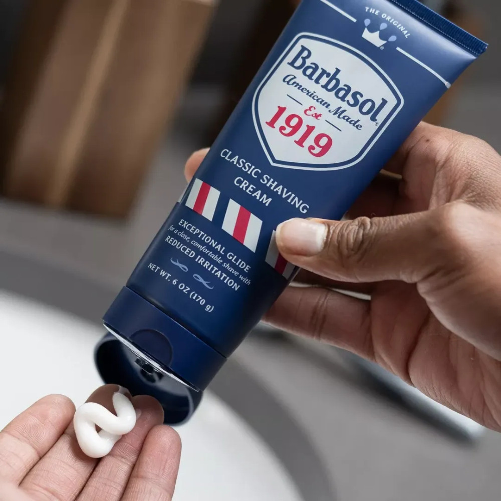 Non-aerosol shaving cream with citrus and essential oil fragrance
