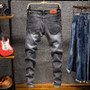 K J Quality men's  Denim fashion  stone jeans"