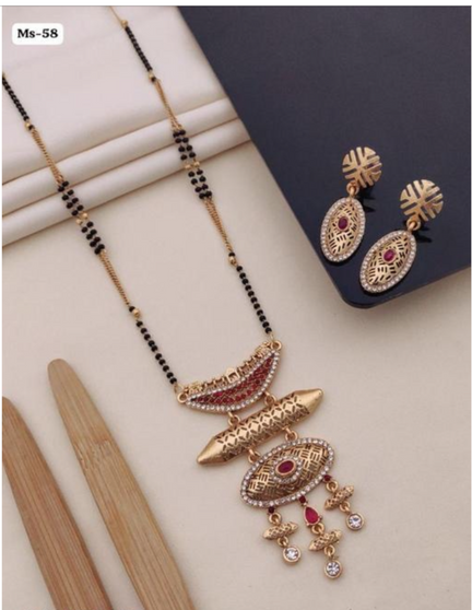 antique gold mangalsutra set with red stone pendant