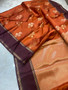 Traditional banarasi saree close up showing zari buti craftsmanship