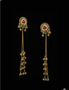 Bridal gold tone jhumka earrings with artificial stones and intricate design